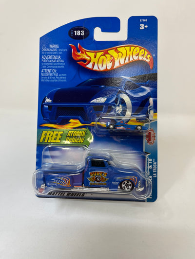 La Troca #183 w/ Atomic Car * Blue * 2003  Hot Wheels