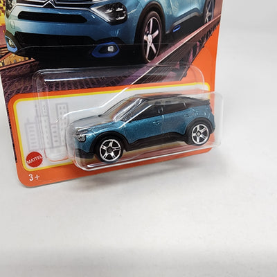 Citroen e-C4 #84 * Aqua * 2024 Matchbox Basic Case K