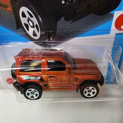 Mitsubishi Pajero Evolution #169 * Orange * 2024 Hot Wheels Basic w/ Factory Holo