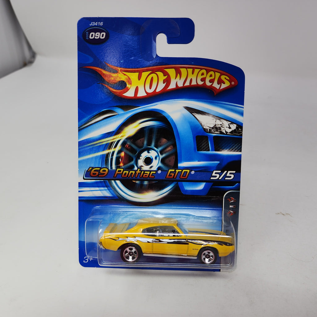 69 Pontiac GTO #90 * Yellow * Hot Wheels 2006