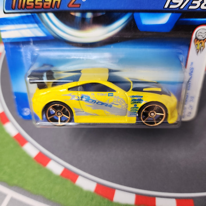 Nissan Z #19 * Yellow w/ FTE Rims * 2006 Hot Wheels First Edition