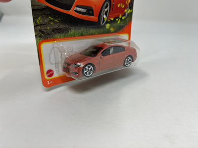 Holden VF Commodore SSV #68 * Orange * 2024 Matchbox Basic Case G New Release