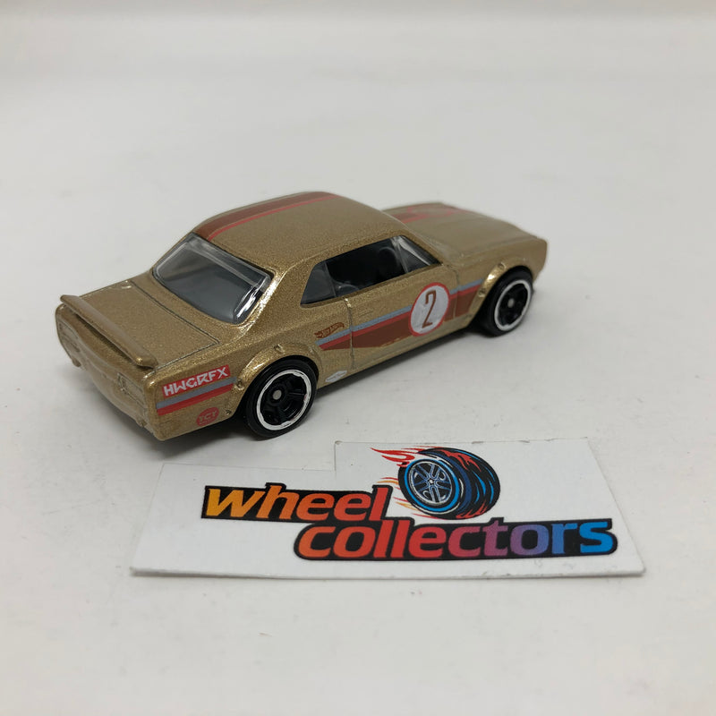 Nissan Skyline 2000 GT-X * Gold * Hot Wheels 1:64 scale Diecast Loose